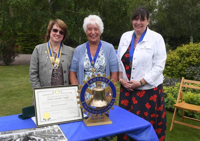 Barbara Roberts (middle) handing over to Cath Hamblin (left), Ann Waldeck - Rotary Club of Sleaford president elect (right) EMN-210628-101907001