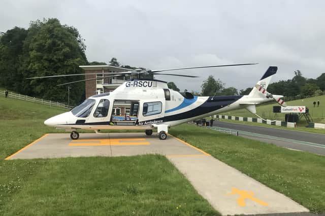 The new coastal air ambulance touches down at Cadwell Park, near Louth. EMN-210629-155830001