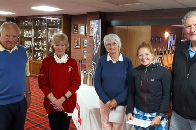 The winning team with Lord-Lieutenant of Lincolnshire Toby Dennis (left) and Lady Sarah McCorquodale (second left).