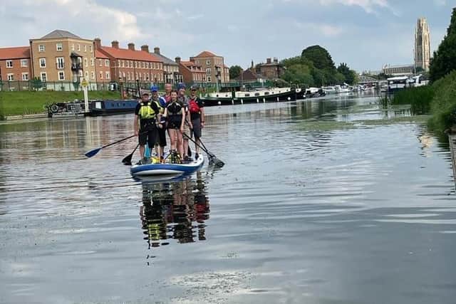 The Slea Paddlers team arriving in Boston. EMN-210507-185515001