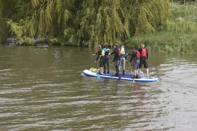 Slea Paddlers practising on the paddle board. EMN-210107-131508001