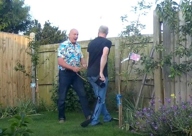 Councillor Matthews, pictured confronting Mr Ashwin.