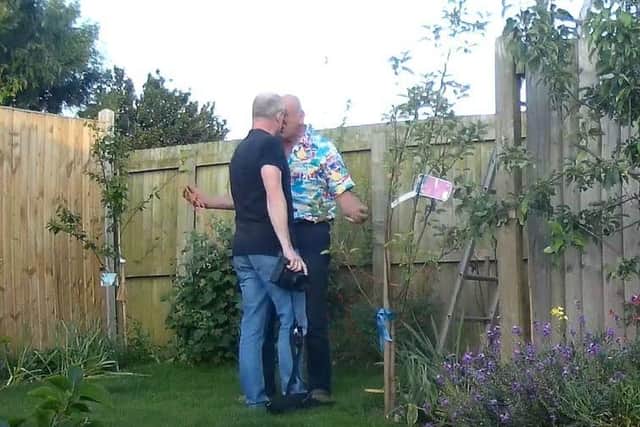 Councillor Matthews, pictured confronting Mr Ashwin.