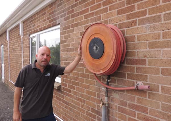 Martin Osborne - he kept the old hose reel on the side of the building as a knod to its former use. EMN-210207-170407001