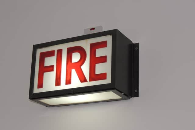 Martin salvaged the 'FIRE' light box from the front of the bulding. EMN-210207-170418001
