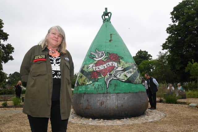 Artist Carrie Reichardt with her buoy EMN-210507-072518005