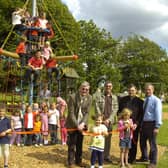 Coun Peter Bedford officially opening the new play equipment in Freiston 10 years ago. Pictured holding the ribbon (from left) are Charlie Fairman, seven, Gabriella Bedford, four, Cerys Horrey, seven. Pictured (back, from left) Coun Bedford, John Wright and Alistair Godwin, management committee for playing field association, and the Rev Andrew Higginson.