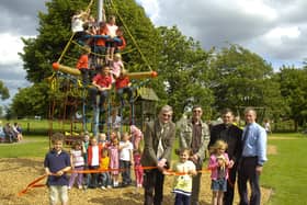 Coun Peter Bedford officially opening the new play equipment in Freiston 10 years ago. Pictured holding the ribbon (from left) are Charlie Fairman, seven, Gabriella Bedford, four, Cerys Horrey, seven. Pictured (back, from left) Coun Bedford, John Wright and Alistair Godwin, management committee for playing field association, and the Rev Andrew Higginson.