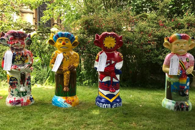 Just some of the school's Imp sculptures, including Queen Elizabeth School's in Gainsborough (centre).