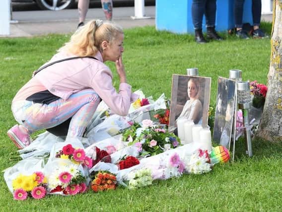 A vigil was held in Chapel St Leonards following the murder of Bethany Vincent, 26, and her nine-year-old son Darren Henson