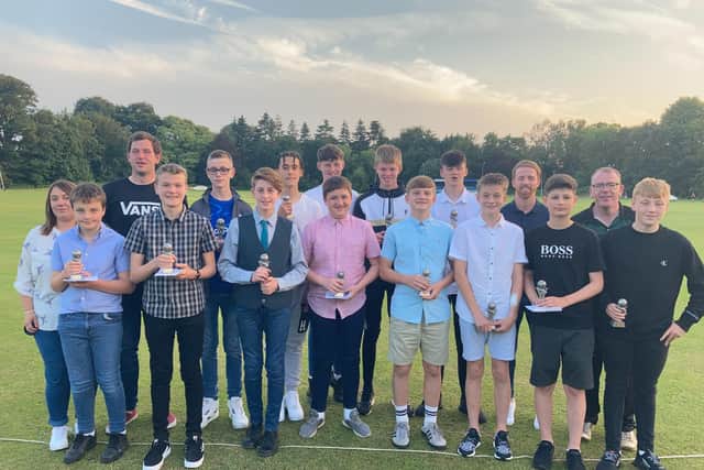 The whole U14 team and their supporters are celebrating their outstanding success