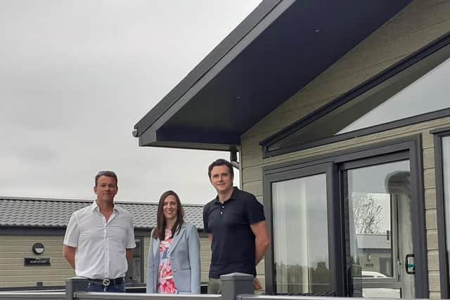 Lloyd Silvester (left), of Sycamore Farm Park Ltd, pictures with Debbie Harper, HSBC UK Area Corporate Director for East Midlands, and Phil Simpson HSBC UK Asset Finance Relationship Director.