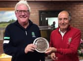 Brian Stone ( Radcliffe) presents the Friendship Trophy to Mike Thornton.