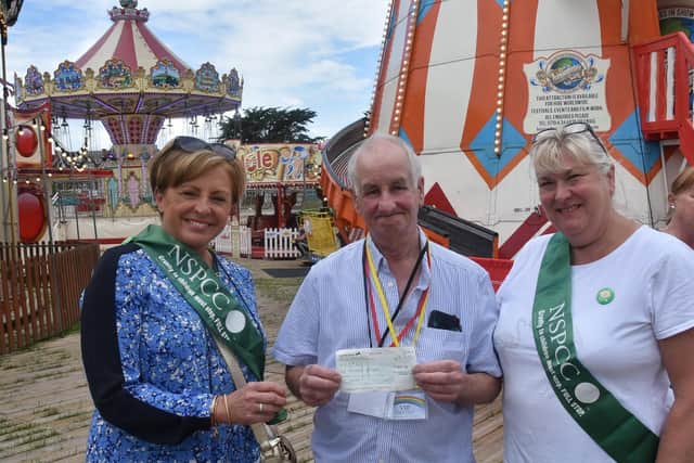Tony Hogg of Ambassador Taxis presents a cheque for £1,000 to Sally Hobbins (left) and Anne Roberjot of the Skegness area branch of the NSPCC. Photo: Barry Robinson.