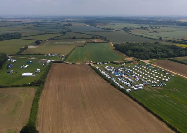 These drone images show hundreds of swingers arriving at a four-day sex festival near Oasby and Aisby. Photo: SWNS Jon Mills EMN-210707-144851001