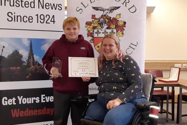 Carer of the Year Leo Ridley with mum Karen Cooper.
