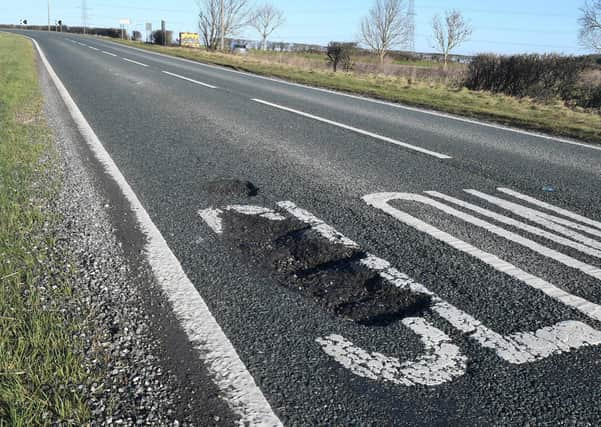 Potholes on the A15. EMN-210624-171823001