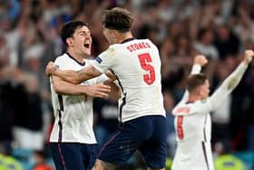 Harry Maguire and John Stones celebrate victory over Denmark. Photo: Getty Images