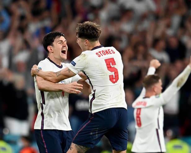 Harry Maguire and John Stones celebrate victory over Denmark. Photo: Getty Images