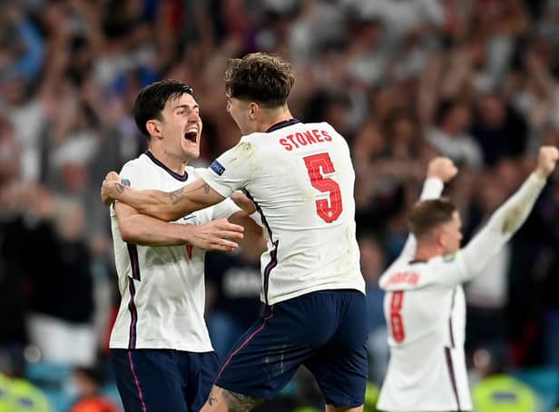Harry Maguire and John Stones celebrate victory over Denmark. Photo: Getty Images