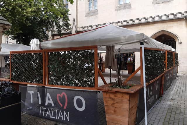 The trellis and planters at Tiamo have been repaired by friends and supporters in space of the morning since vandals trashed the place on Sunday night. Tables and chairs are harder to replace. EMN-211207-140333001