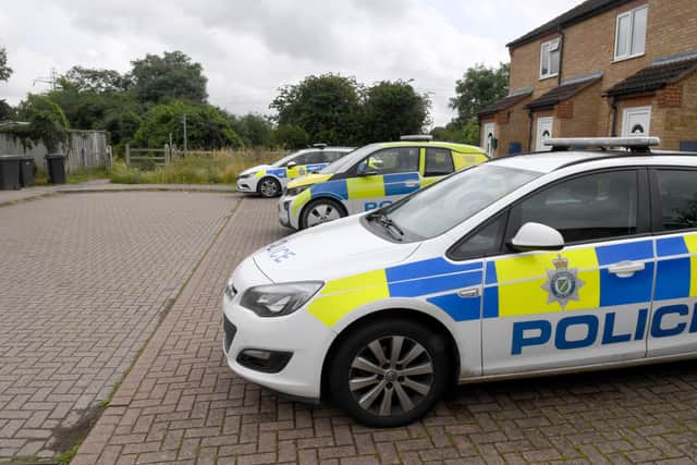 Police incident on Mareham Pastures. Cars parked on Lavender Close. EMN-211207-114446001