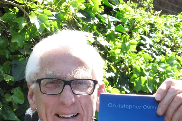 Christopher Owen pictured with his new book.