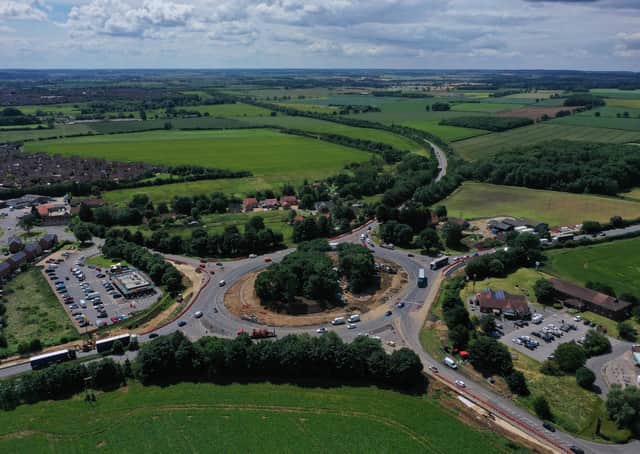 Work ongoing at Holdingham roundabout. EMN-210713-234226001