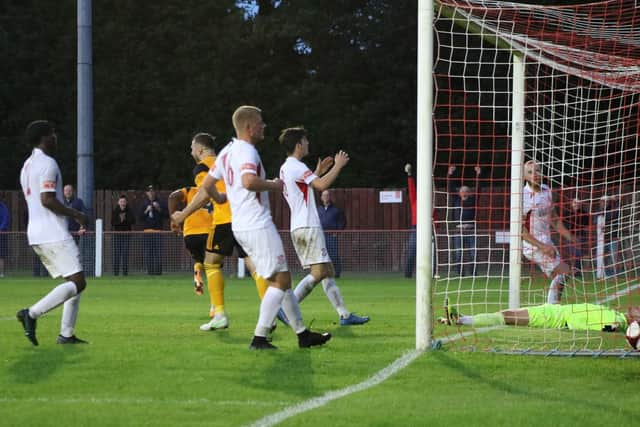 Elliott finds the net. Photo: Oliver Atkin