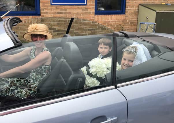 Here comes the bride ... Tilda Riley arrives at Winchelsea Primary School's mock wedding.