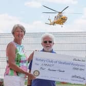 President Angela Bailey is pictured with Rotarian Keith Austen giving the ?400 cheque to Kelly Geoghegan, the Fundraising Events Co-Ordinator for the LNAACT. EMN-210907-145301001