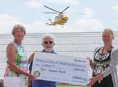 President Angela Bailey is pictured with Rotarian Keith Austen giving the ?400 cheque to Kelly Geoghegan, the Fundraising Events Co-Ordinator for the LNAACT. EMN-210907-145301001