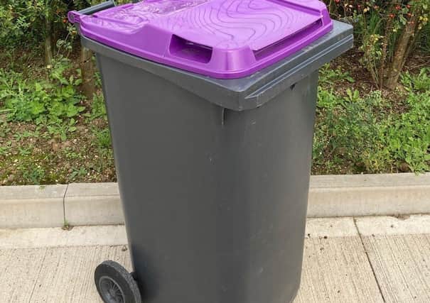 Purple-lidded bins for recycling paper and card with be delivered to NOrth Kesteven households during August. EMN-210715-221505001