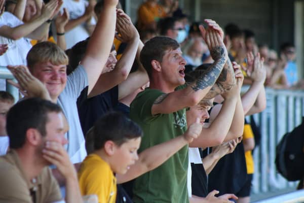 Fans watch the Pilgrims win 5-0 against Lincoln. Photo: Oliver Atkin