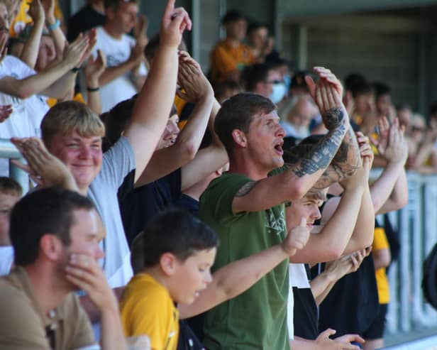 Fans watch the Pilgrims win 5-0 against Lincoln. Photo: Oliver Atkin