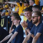 Fans get their first taste of the action. Photo: Oliver Atkin