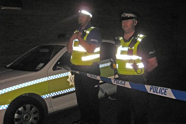 Police on the evening of the explosion.
