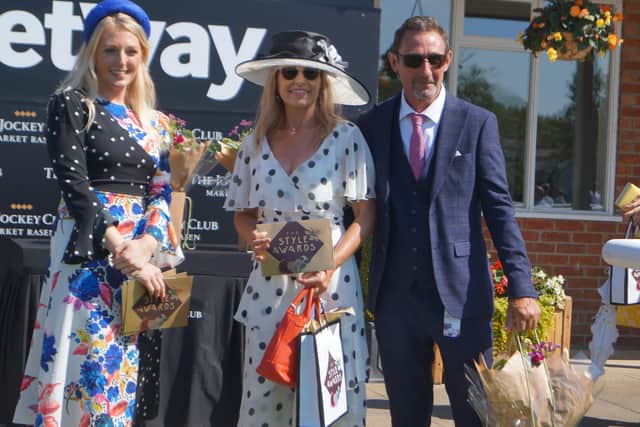 Karen and Darryl Beech from Hope Valley in Derbyshire came third in the Best Dressed competition and received their prize from Jessica of Jessica Rea Millinery EMN-210718-110528001
