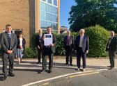 Signing the climate pledge. From left - North Kesteven District Council Chief Executive Ian Fytche, Executive Members Coun Sally Tarry and Coun Mervyn Head, Council Leader Coun Richard Wright, Executive Member Coun Ray Cucksey, Deputy Council Leader and Executive Member Coun Ian Carrington and Executive Member Coun Steve Clegg. EMN-210719-194109001
