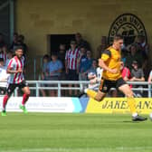 Scott Duxbury in action against Lincoln City. Photo: Oliver Atkin
