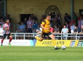 Scott Duxbury in action against Lincoln City. Photo: Oliver Atkin