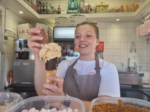 Amelia Fravigar putting the finishing touches to a salted caramel ice-cream at Seaside Treats in Tower Esplanade, Skegness.