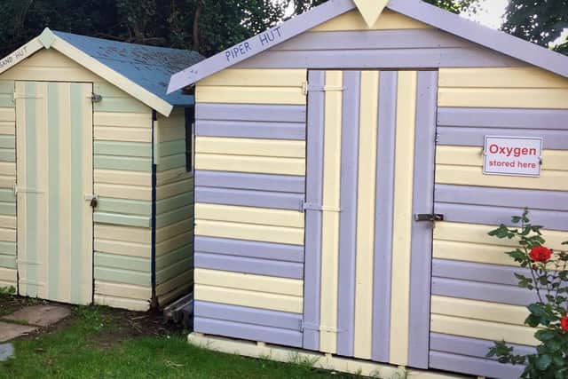The beach huts at Sandpiper Care Home in Alford
