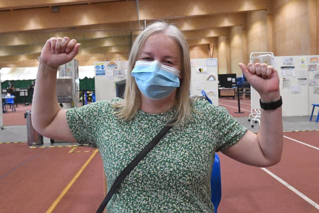 A shot in the arm. Lisa Szirtes of Sleaford received the 1 millionth vaccination in Lincolnshire, at PRSA vaccination centre, Boston. EMN-210723-142612001