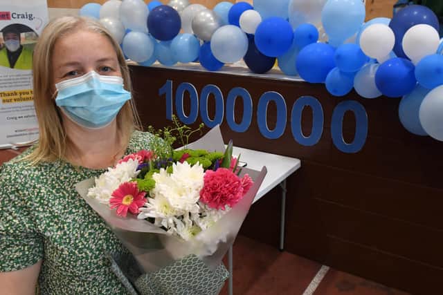 Major milestone. Lisa Szirtes of Sleaford received the 1 millionth vaccination in Lincolnshire, at PRSA vaccination centre, Boston. EMN-210723-142636001