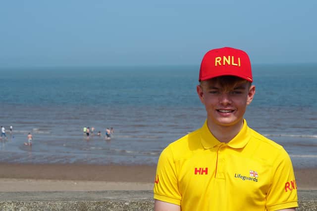 RNLI lifeguard Arthur Jackson helped a young bodyboarder after he was swept out to sea towards a rocky structure. (Photo: RNLI/Derry Salter).