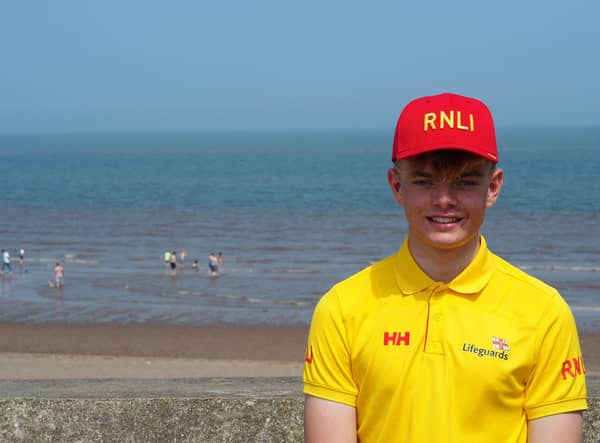 RNLI lifeguard Arthur Jackson helped a young bodyboarder after he was swept out to sea towards a rocky structure. (Photo: RNLI/Derry Salter).
