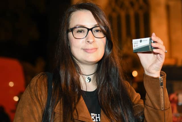 Reclaim the Night walk organiser Jade Hope with an attack alarm donated by local businesses. EMN-210726-100849001