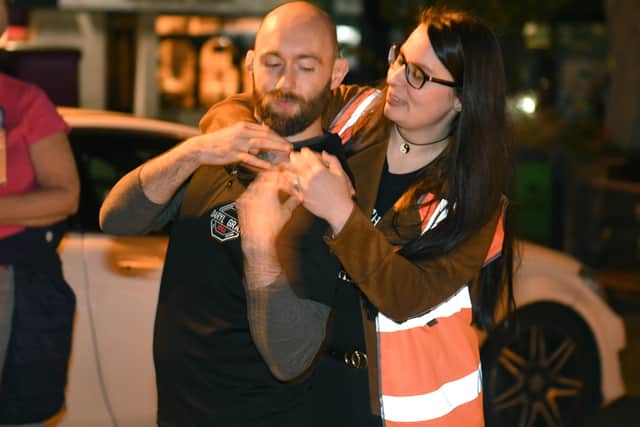 Reclaim the Night walk organiser Jade Hope with Daryl Grant, demonstrating self defence moves. EMN-210726-100901001
