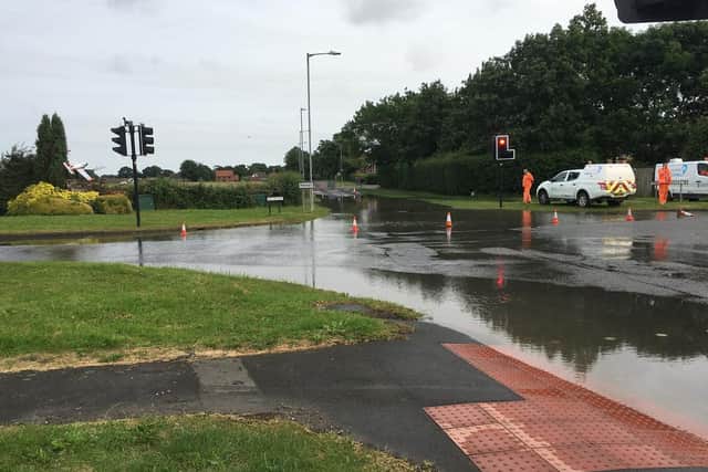 Flooding at the B1200 crossroads in Manby. Photo: Ian Butcher